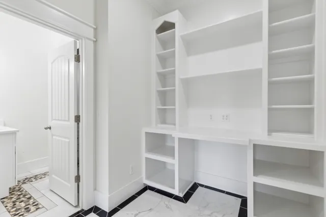 a view of an empty walk in closet