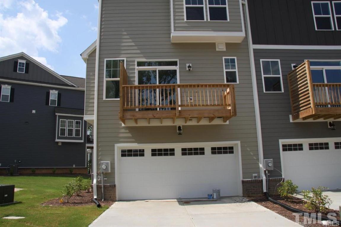 2919 Sunflower Road Apex, NC 27502 - Photo 31 of 34 a balcony view with a seating space