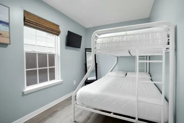 a view of balcony with furniture and umbrella