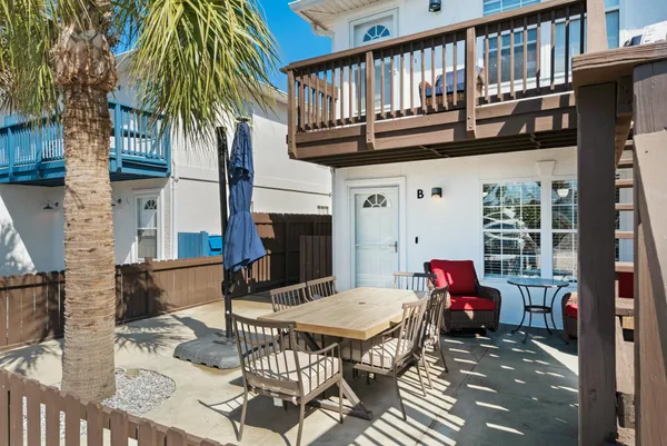 a kitchen with cabinets stainless steel appliances and a counter space