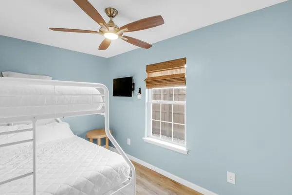 a street sign on a brick wall