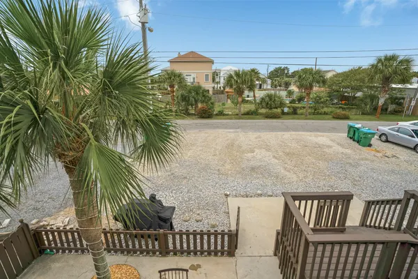 a room with a bed and a flat screen tv