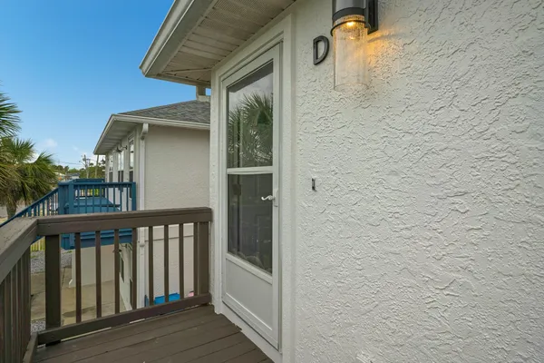 a close view of a utility room with dryer and washer