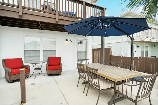 a living room with furniture and white walls