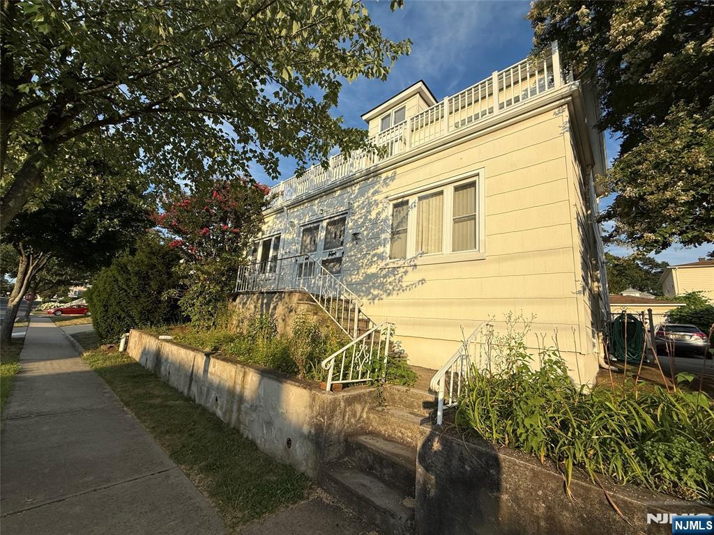 84 9th Street, Unit 1 Wood-Ridge, NJ 07075 - Photo 2 of 22 a view of a house with pool