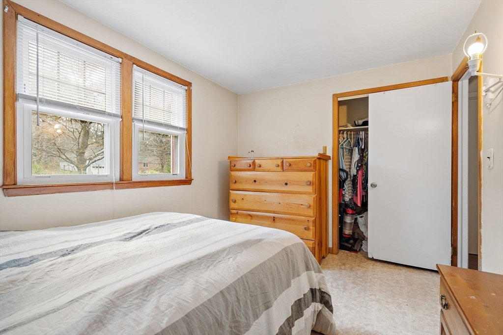 30 Rolling Lane Sudbury, MA 01776 - Photo 17 of 25 a bedroom with a bed dresser and a window