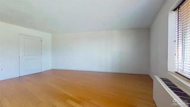 $599,900 | 116-12 Ocean Promenade, Unit 210 | Rockaway Park