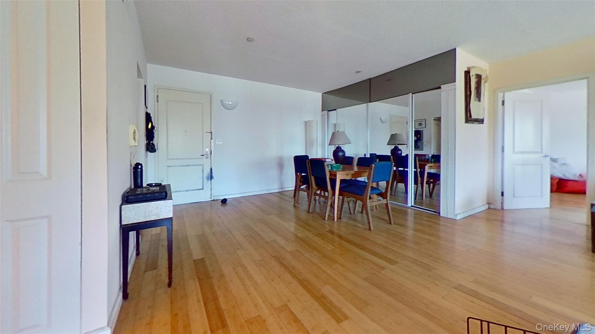 116-12 Ocean Promenade, Unit 210 Queens, NY 11694 - Photo 17 of 28 Dining area with light wood finished floors