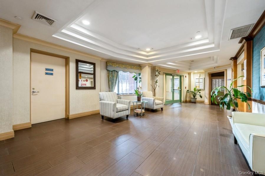 116-12 Ocean Promenade, Unit 210 Queens, NY 11694 - Photo 24 of 28 Building lobby featuring crown molding