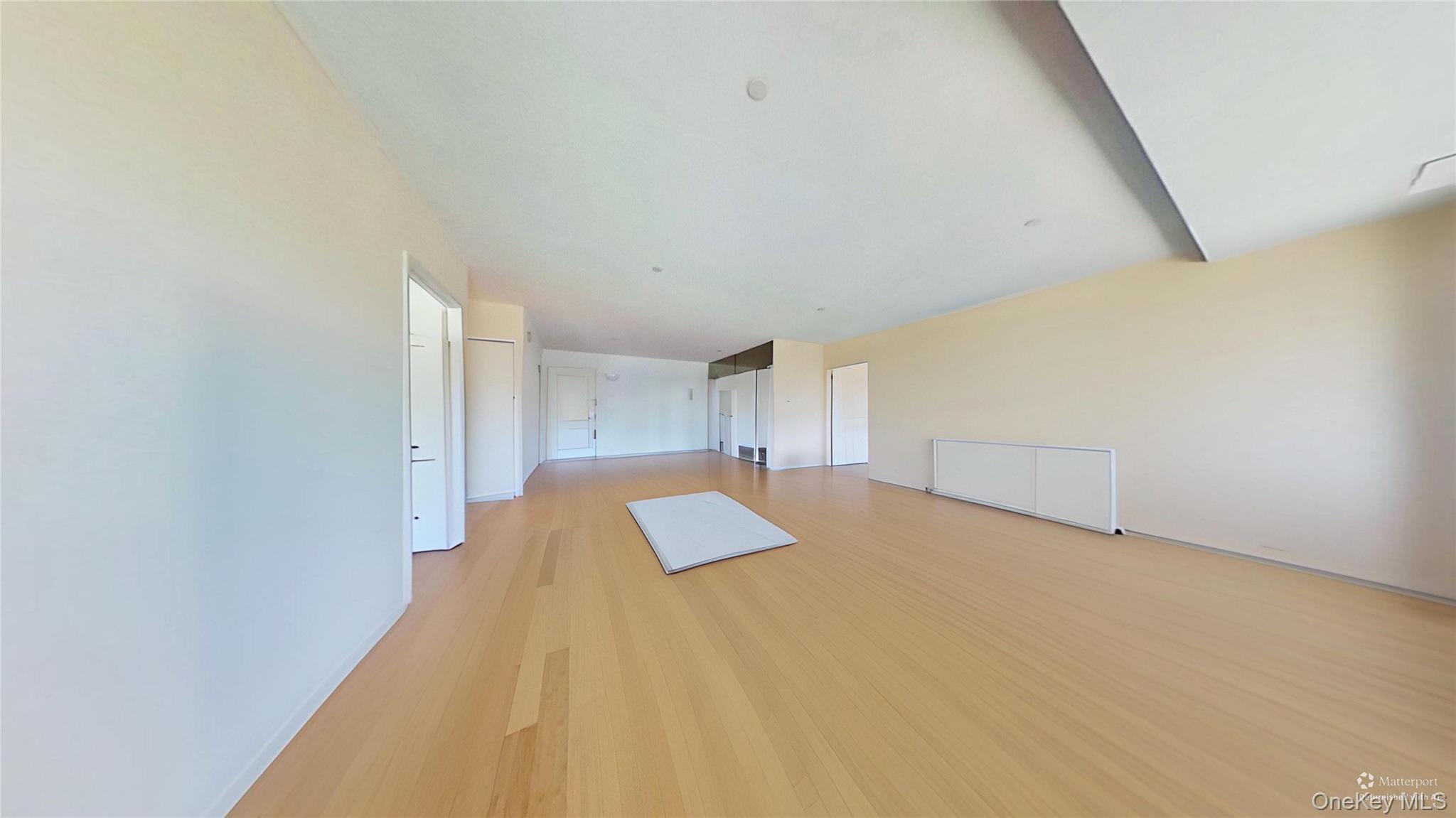 116-12 Ocean Promenade, Unit 210 Queens, NY 11694 - Photo 6 of 28 Additional living space featuring light wood-type flooring