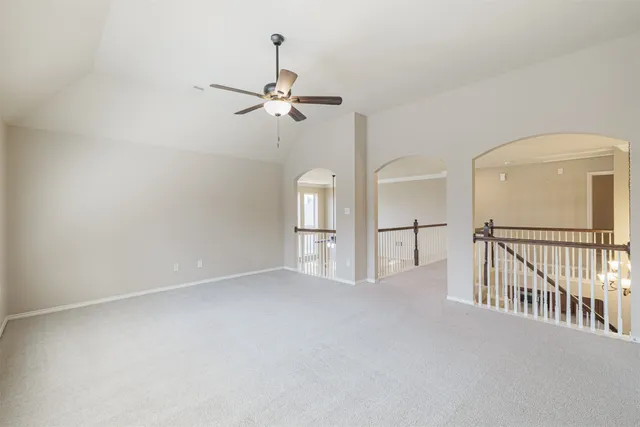 a view of empty room with windows