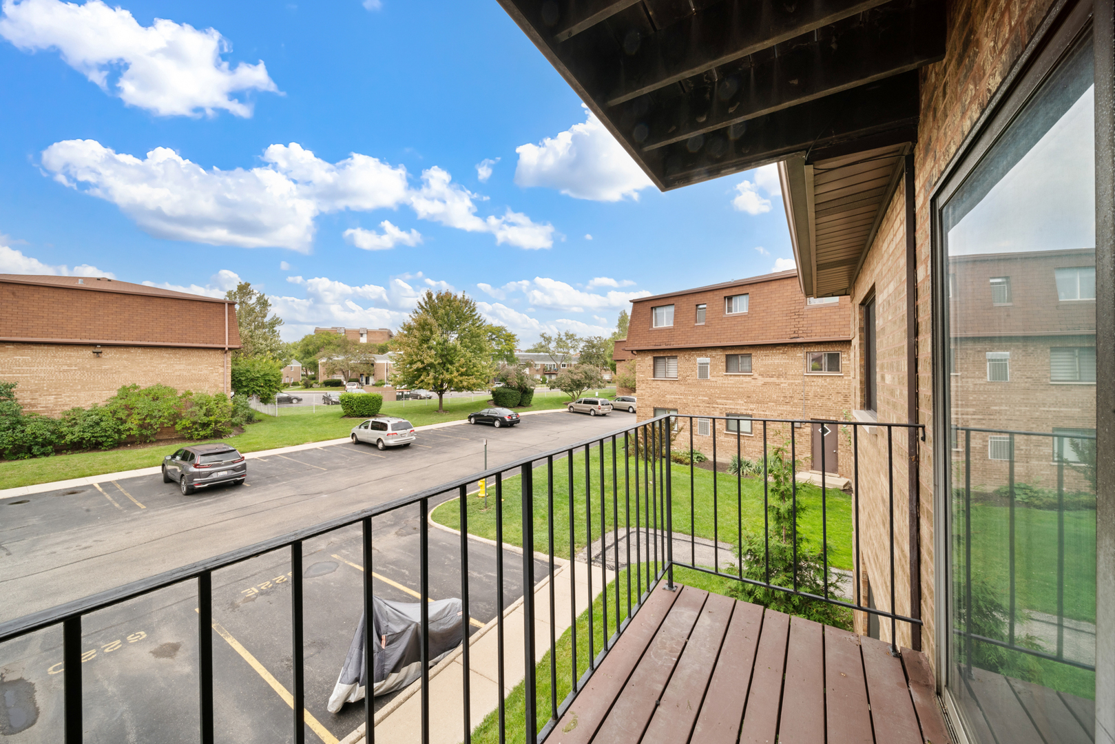 622 Cobblestone Circle, Unit C Glenview, IL 60025 - Photo 15 of 20 a view of a street from a balcony