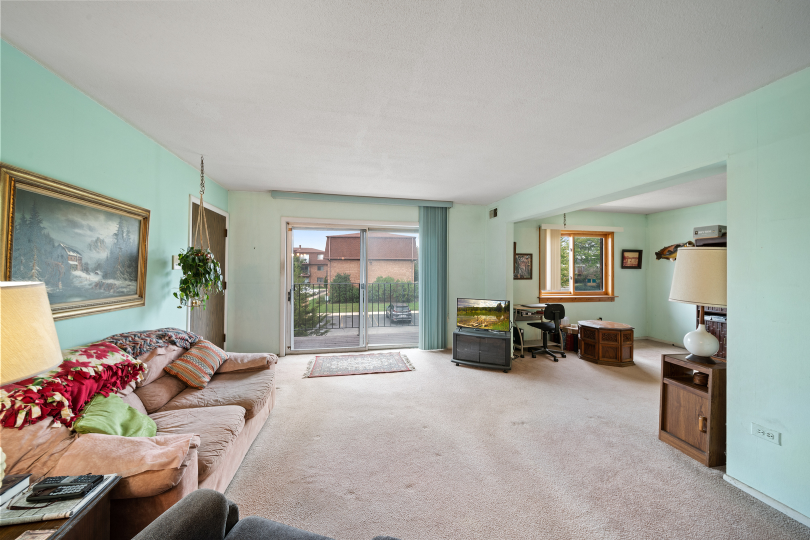 622 Cobblestone Circle, Unit C Glenview, IL 60025 - Photo 5 of 20 a bedroom with furniture and a large window