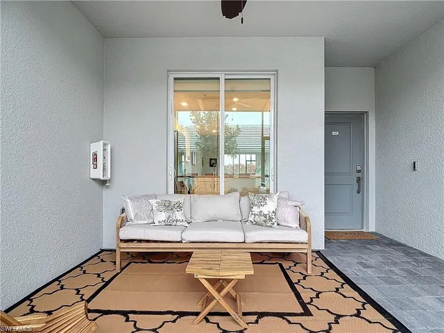 a dining room with a table and chairs