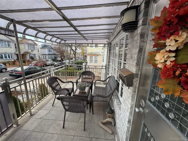 a view of a chairs and table in a patio