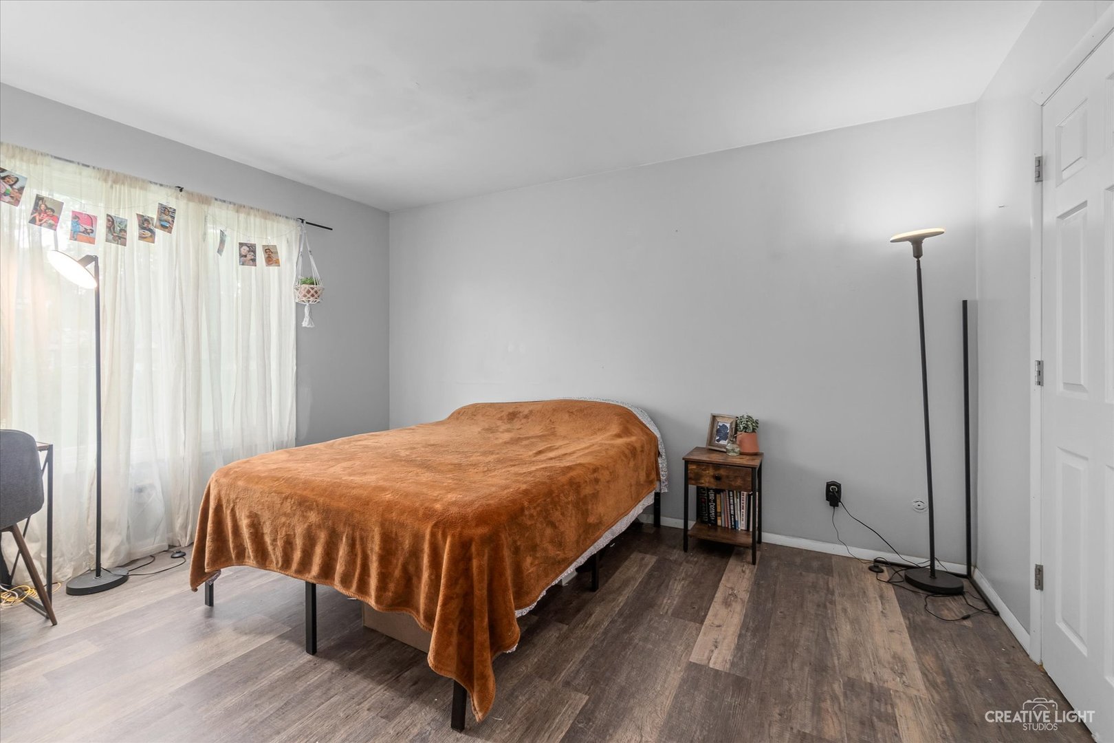 8 Shermead Road Montgomery, IL 60538 - Photo 11 of 17 a bed sitting in a bedroom next to a window and a chair