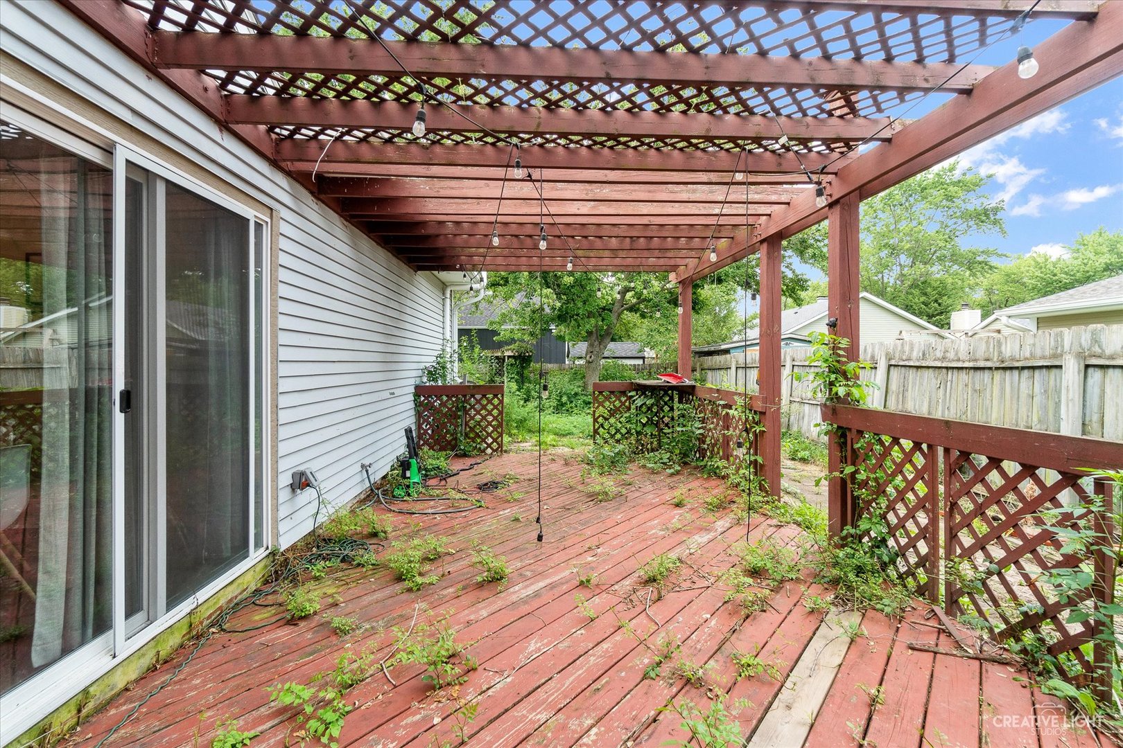 8 Shermead Road Montgomery, IL 60538 - Photo 16 of 17 a view of a porch with a wooden bench