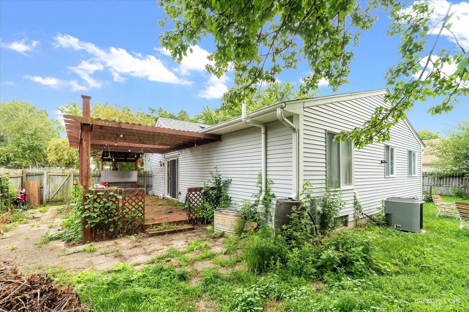 8 Shermead Road Montgomery, IL 60538 - Photo 17 of 17 a front view of a house with garden