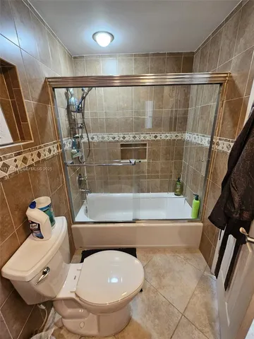 a bathroom with a sink and bathtub