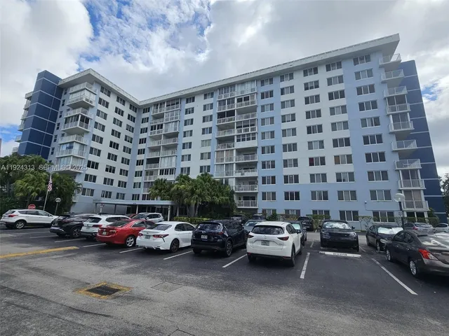 a city view with cars and buildings