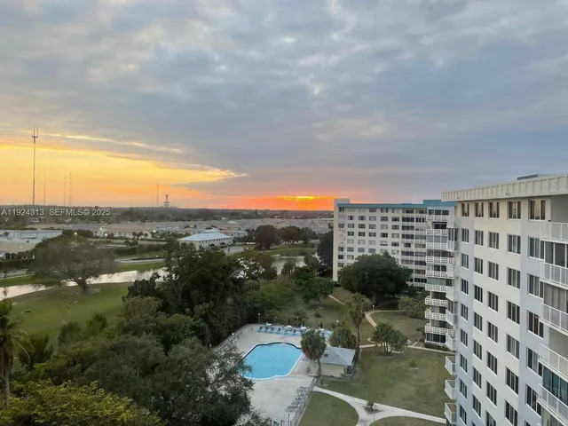 a view of a lake with a city