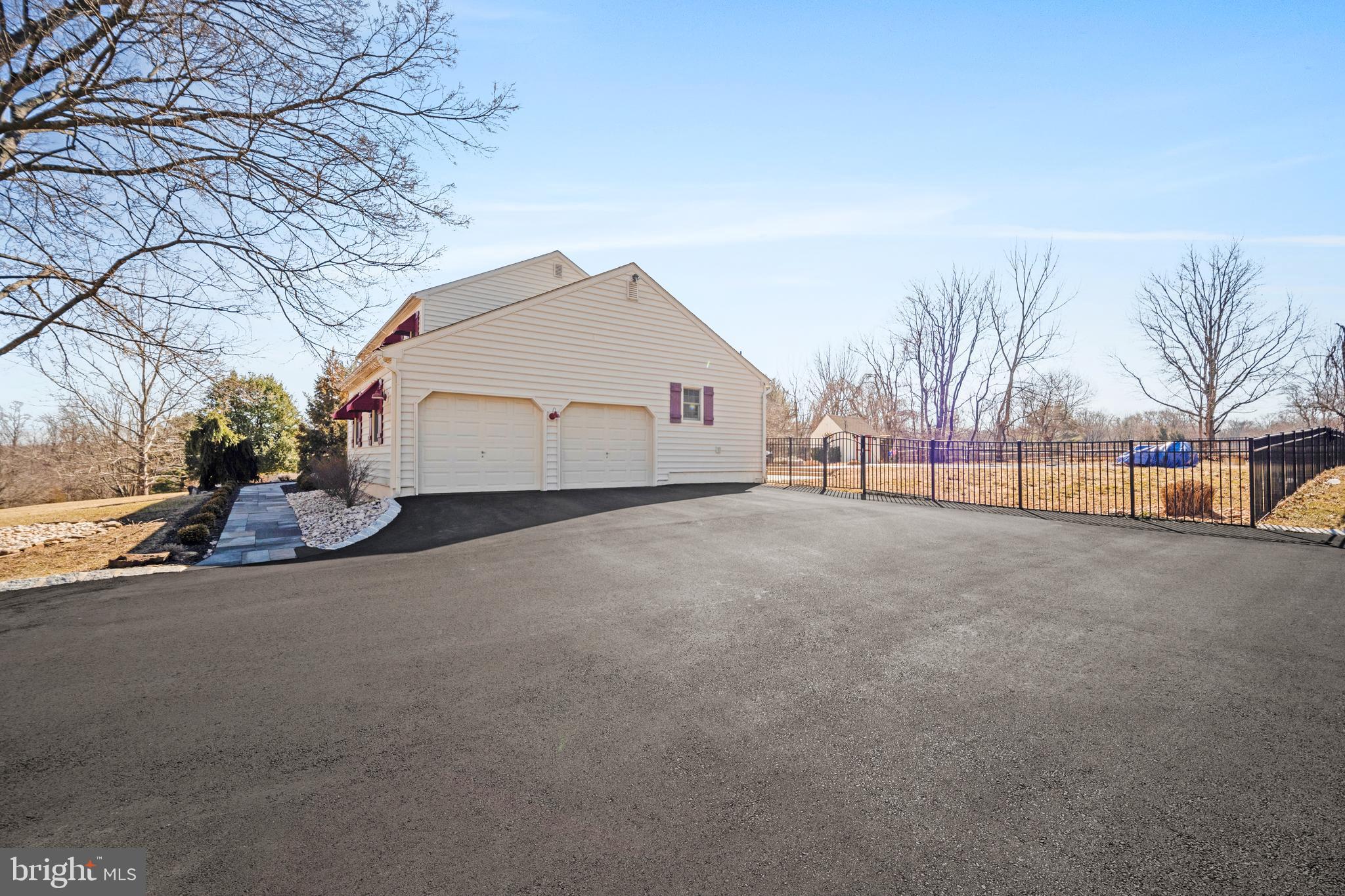 183 Firecreek Road Newtown, PA 18940 - Photo 43 of 43 New Belgium block lined driveway