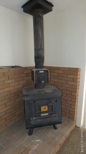 3360 East Rimrock Drive Rimrock, AZ 86335 - Photo 12 of 41 wood stove in sitting room