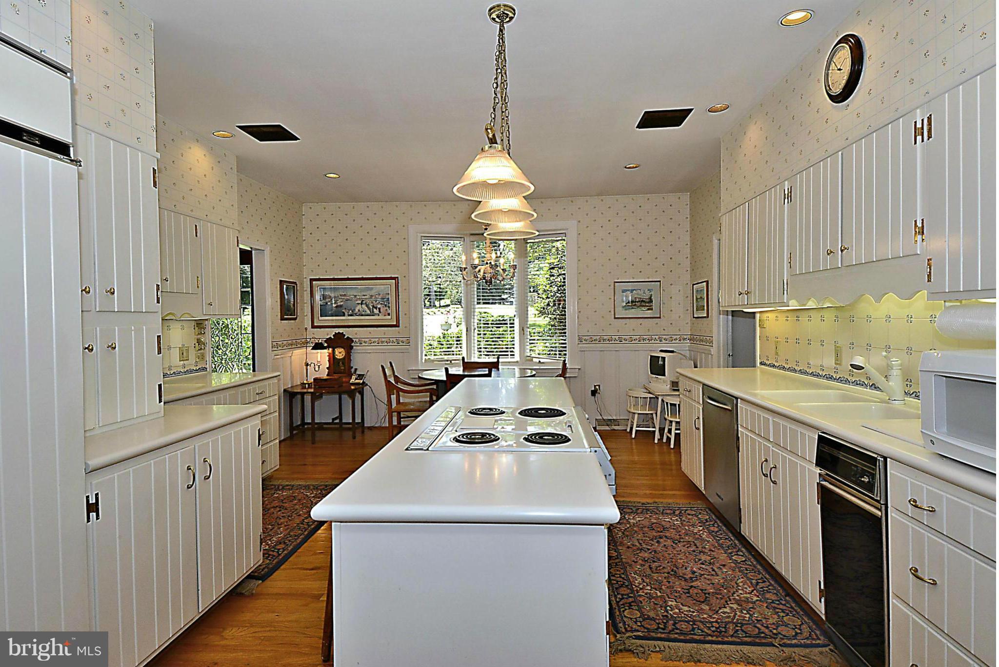 525 Broadwater Road Arnold, MD 21012 - Photo 11 of 30 Kitchen has Corian tops & hardwood.