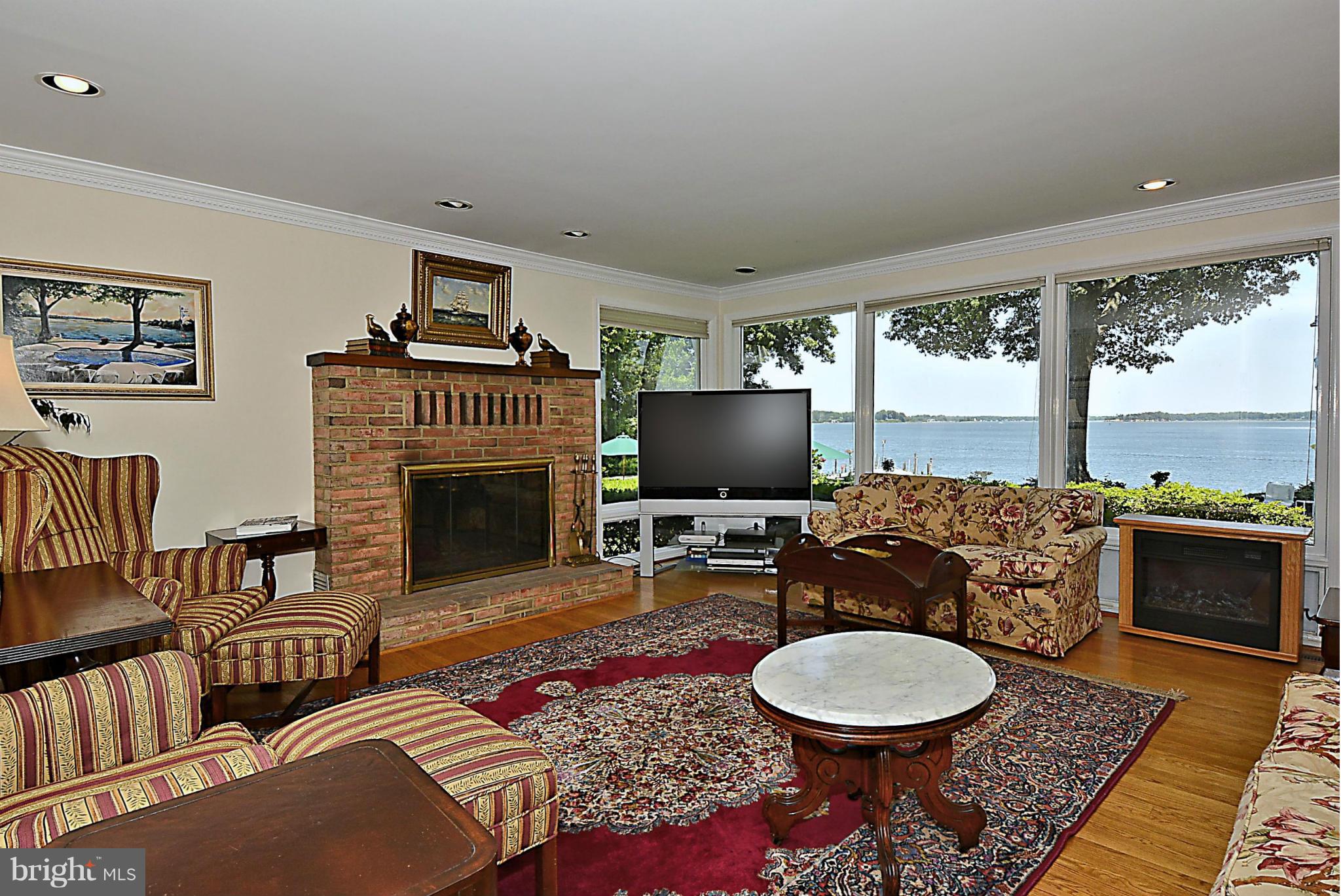 525 Broadwater Road Arnold, MD 21012 - Photo 21 of 30 Family Room has a fireplace & water views too!