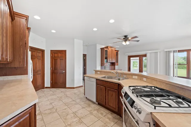 a kitchen with a stove and a sink