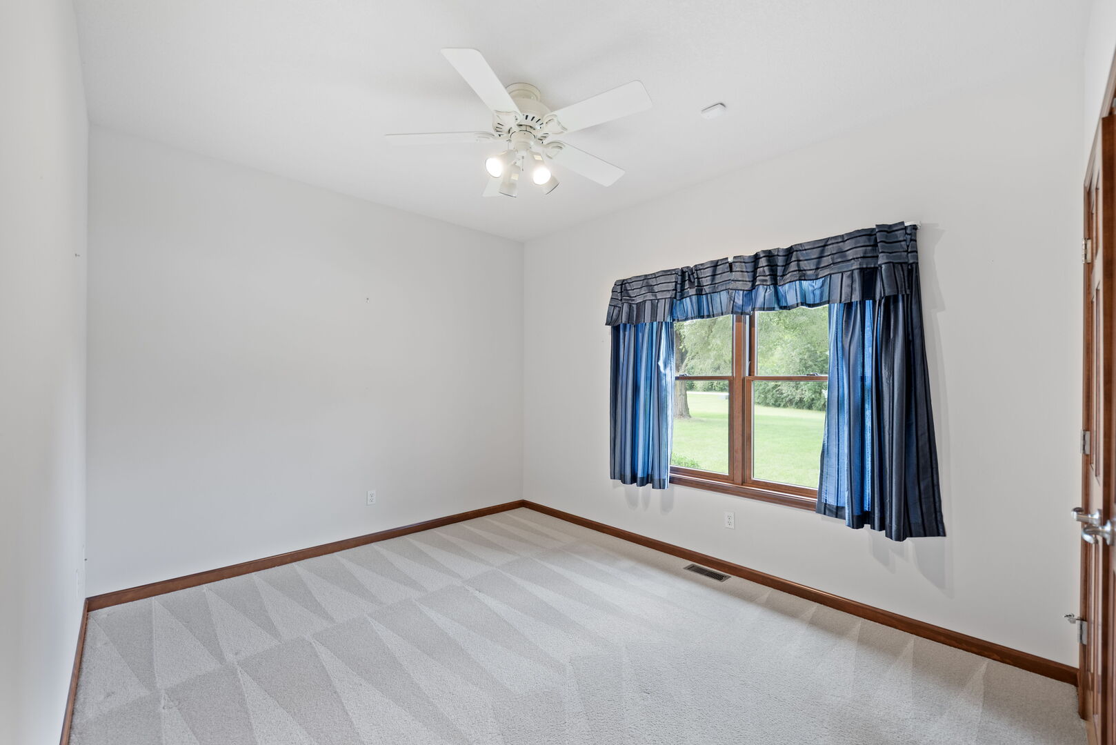2745 South Hieland Road St. Anne, IL 60964 - Photo 19 of 31 an empty room with a window
