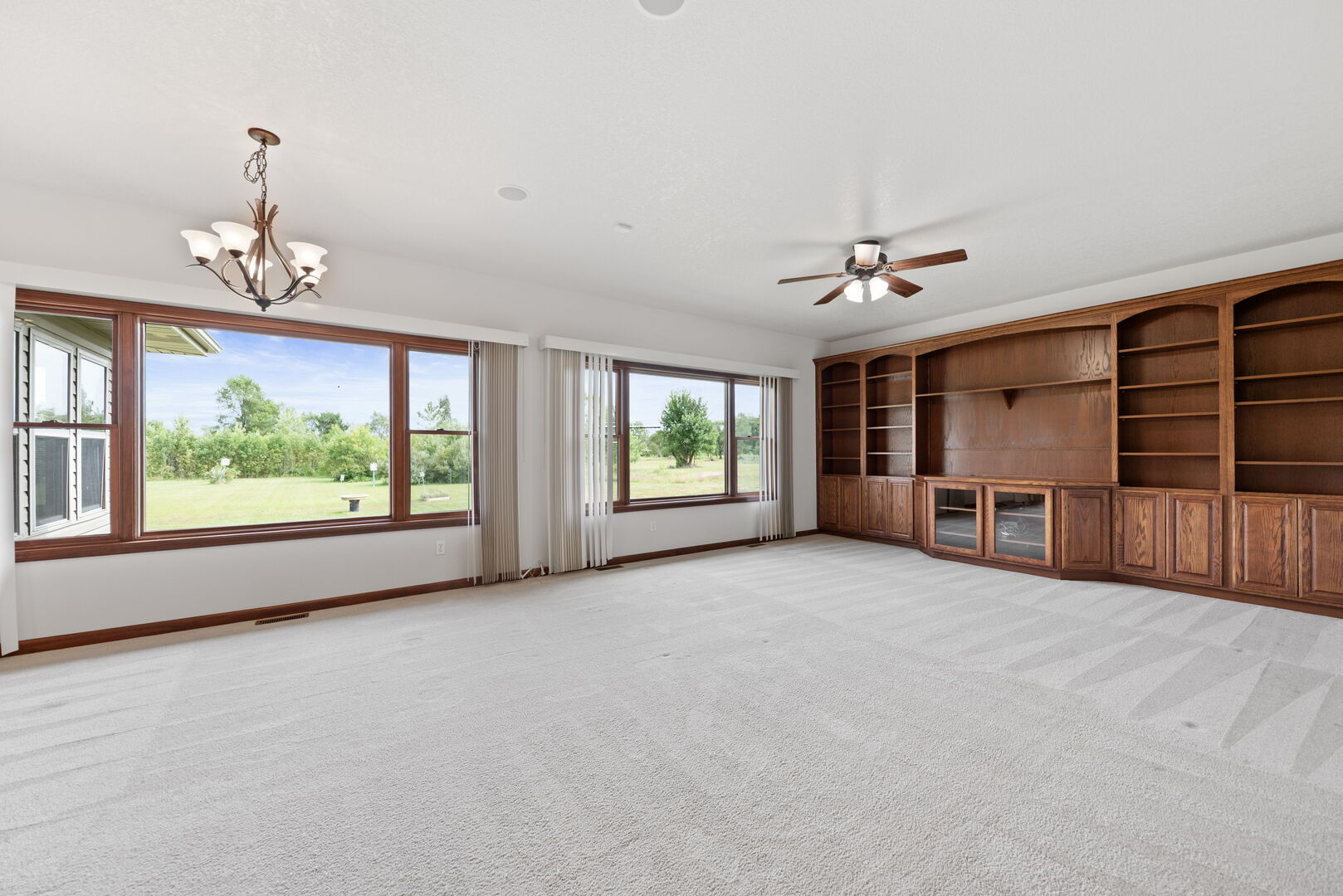 2745 South Hieland Road St. Anne, IL 60964 - Photo 2 of 31 a view of an empty room with a window