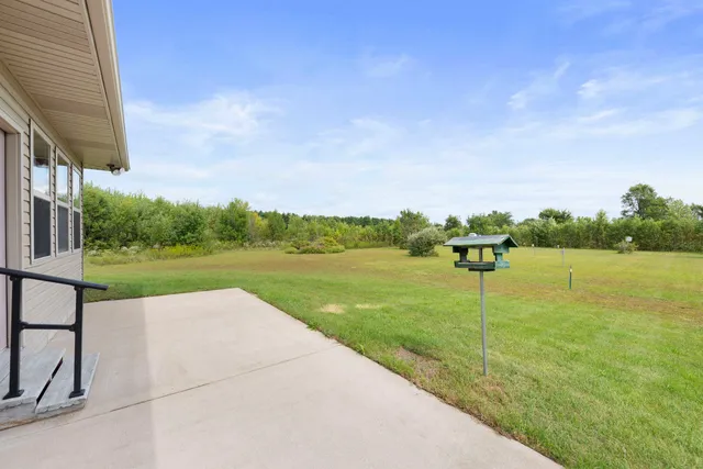 a view of a garden with a lake