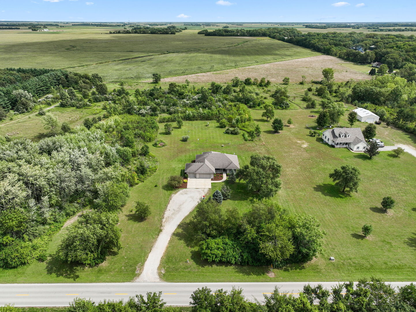 2745 South Hieland Road St. Anne, IL 60964 - Photo 27 of 31 a view of a lake with a houses