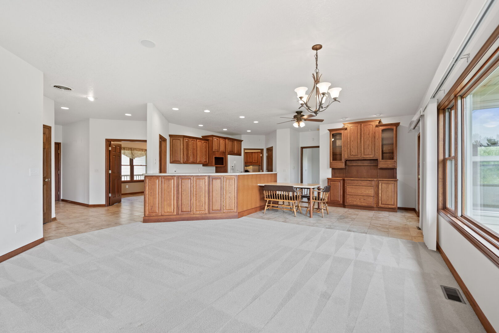2745 South Hieland Road St. Anne, IL 60964 - Photo 8 of 31 a view of kitchen with furniture and a chandelier