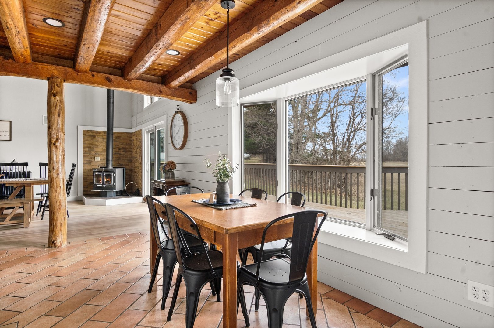 1490 Flora Church Road Kirkland, IL 60146 - Photo 12 of 49 a dining room with furniture a chandelier and wooden floor