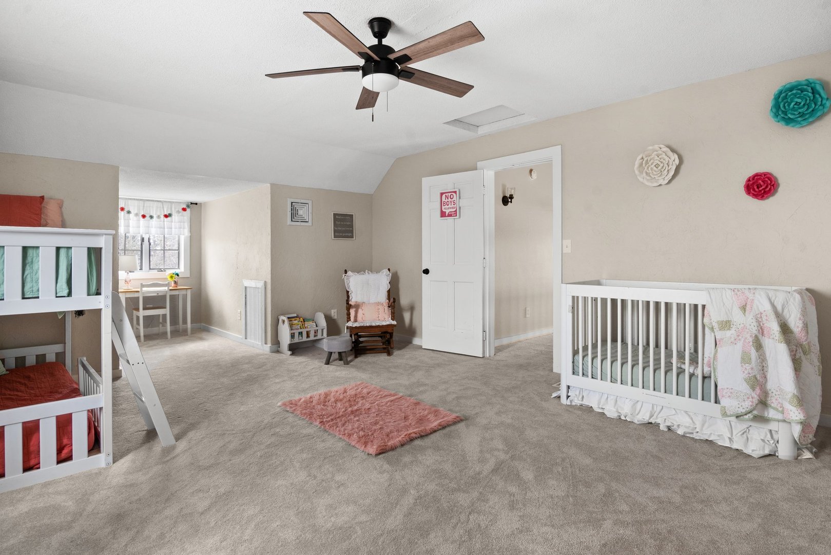 1490 Flora Church Road Kirkland, IL 60146 - Photo 35 of 49 a spacious bedroom with a bed and a book shelf