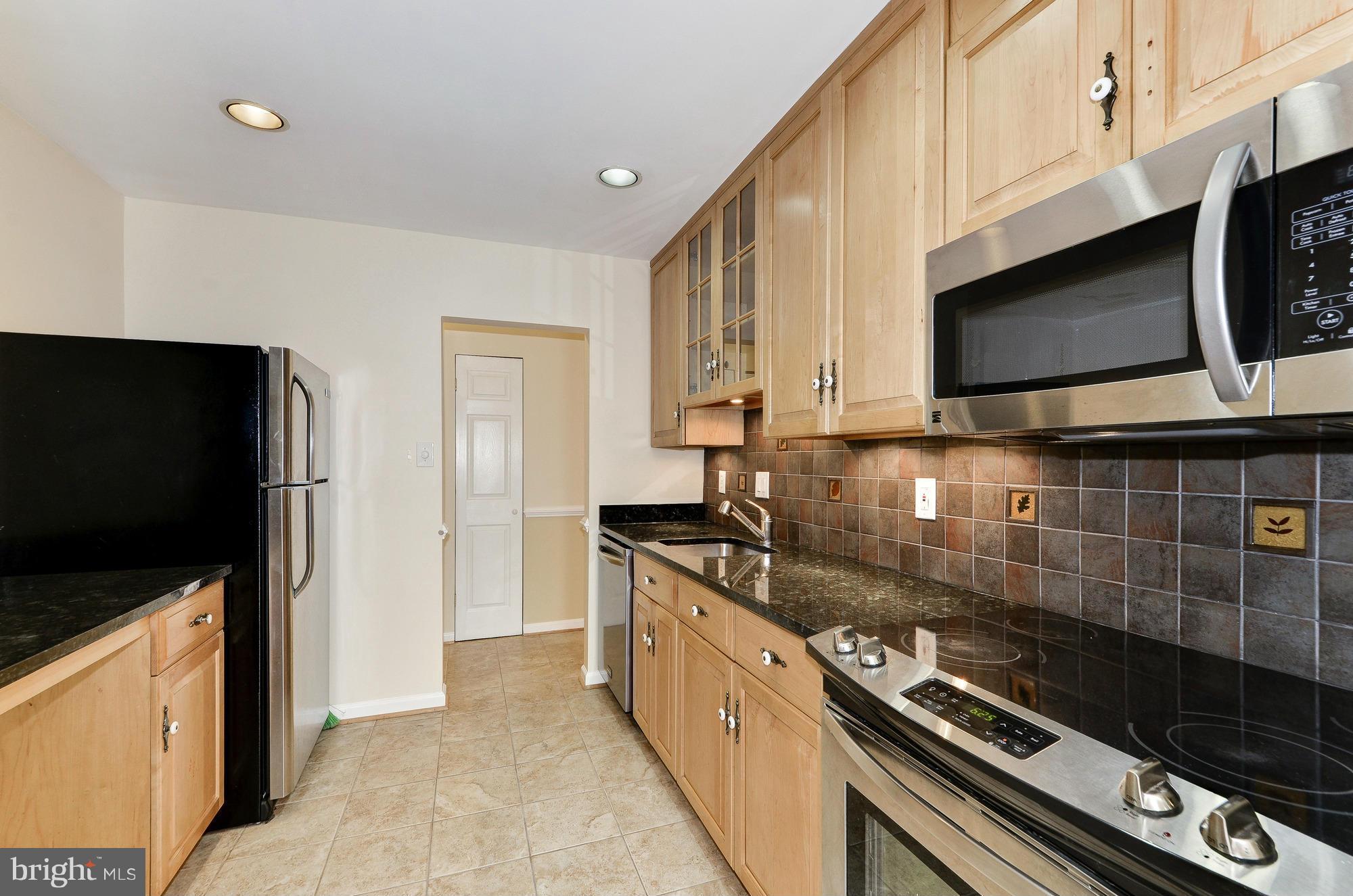 12732 Veirs Mill Road, Unit 8204 Rockville, MD 20853 - Photo 11 of 24 Kitchen
