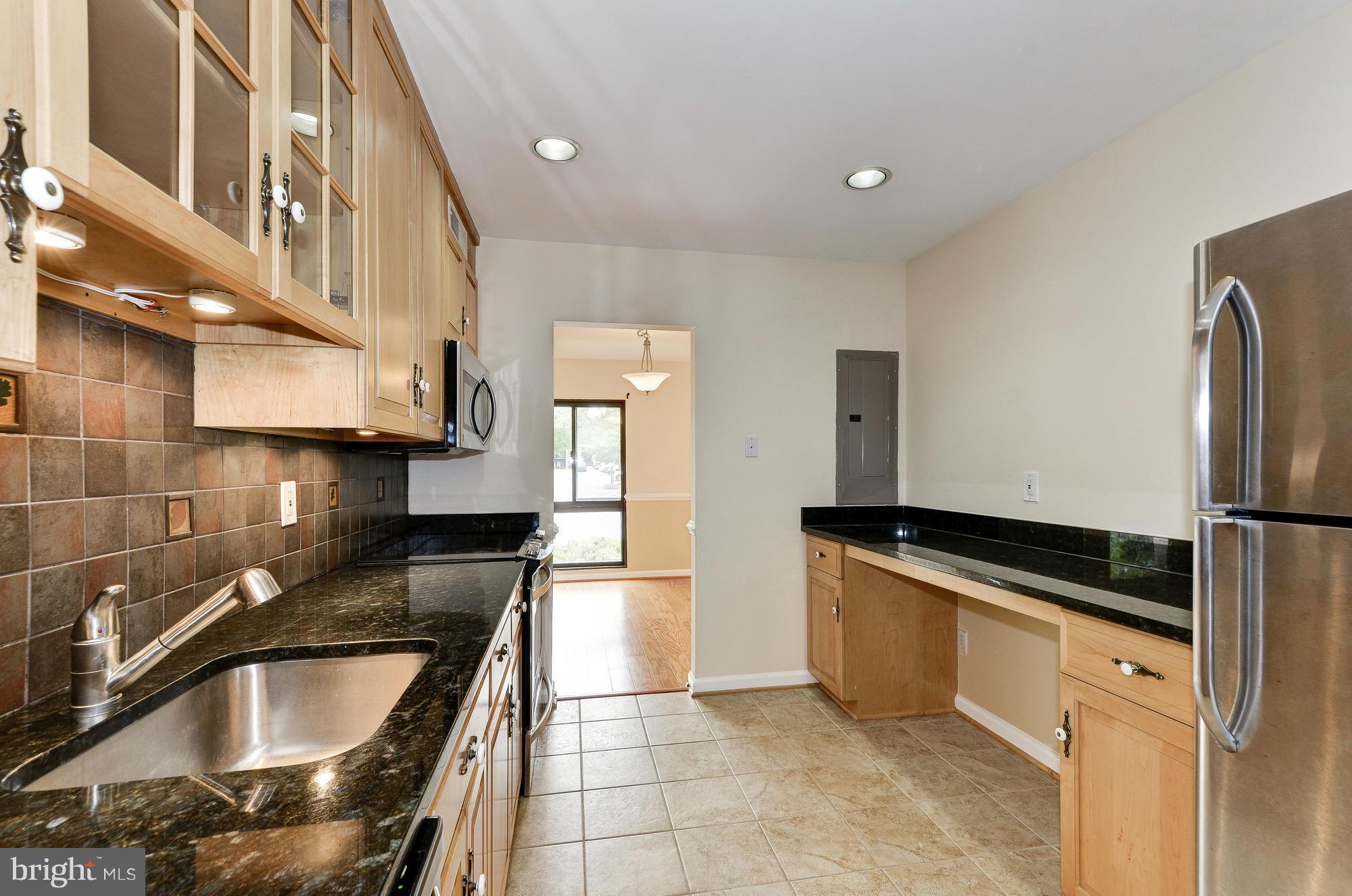 12732 Veirs Mill Road, Unit 8204 Rockville, MD 20853 - Photo 10 of 24 Kitchen
