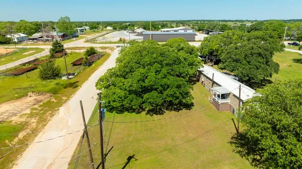 a view of a lake with a building in the background
