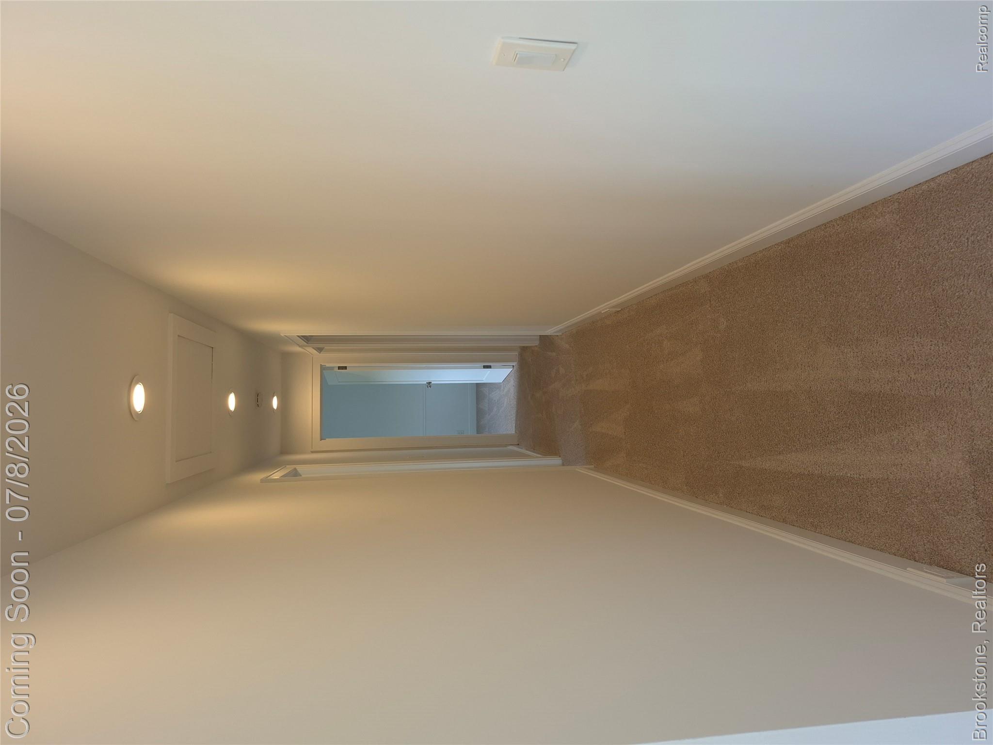 4140 South Henderson Road Davison, MI 48423 - Photo 54 of 98 Hallway featuring light-toned carpeting, white baseboards, recessed ceiling lighting, and light-colored walls