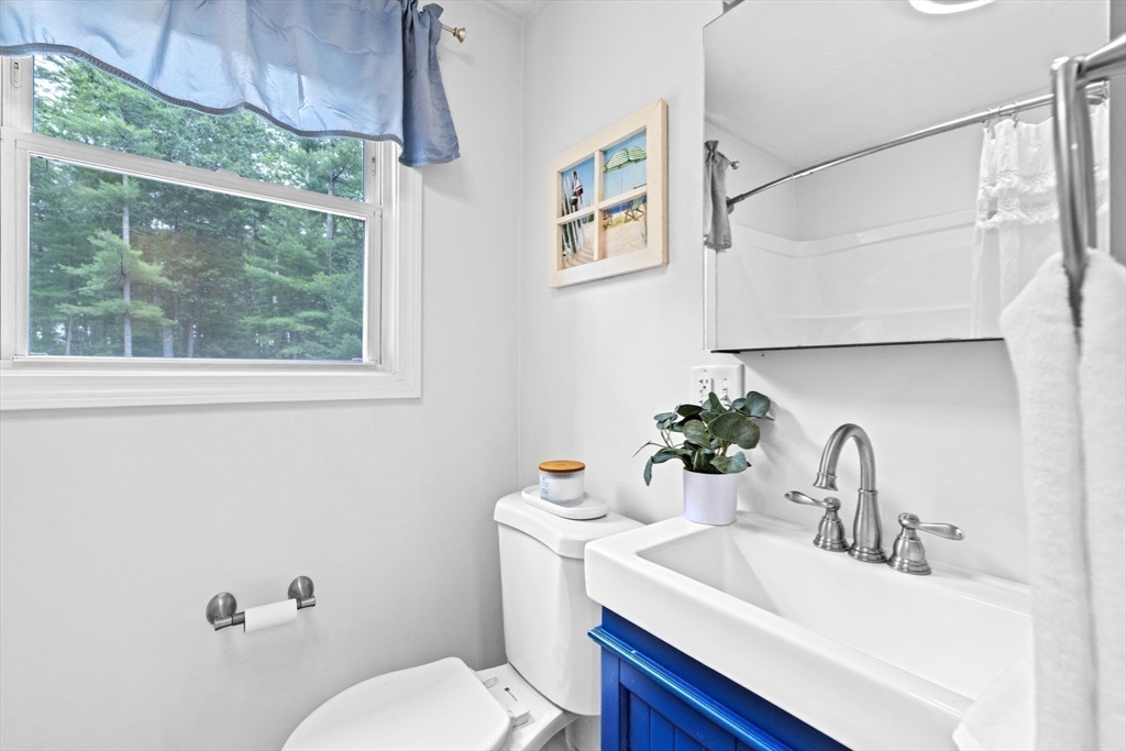 74 Rochester Road Carver, MA 02330 - Photo 17 of 31 a bathroom with a sink mirror and toilet