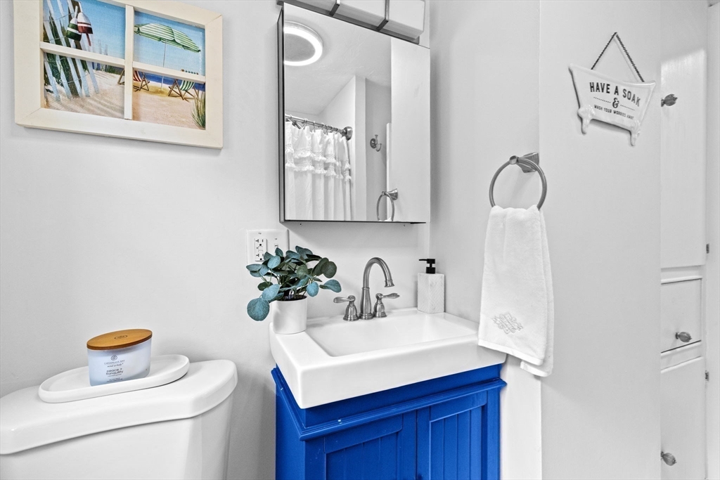 74 Rochester Road Carver, MA 02330 - Photo 18 of 31 a bathroom with a sink vanity and a mirror