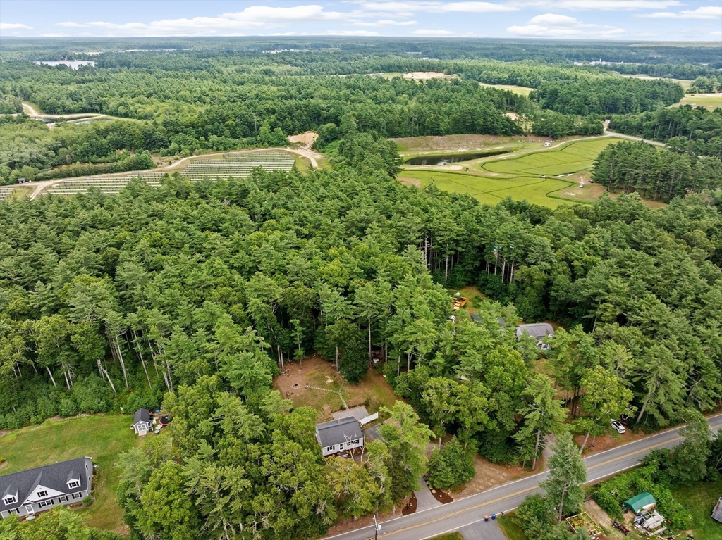 74 Rochester Road Carver, MA 02330 - Photo 28 of 31 an aerial view of residential houses with outdoor space and trees