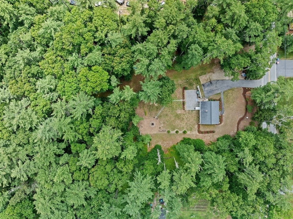74 Rochester Road Carver, MA 02330 - Photo 29 of 31 an aerial view of a house with a yard