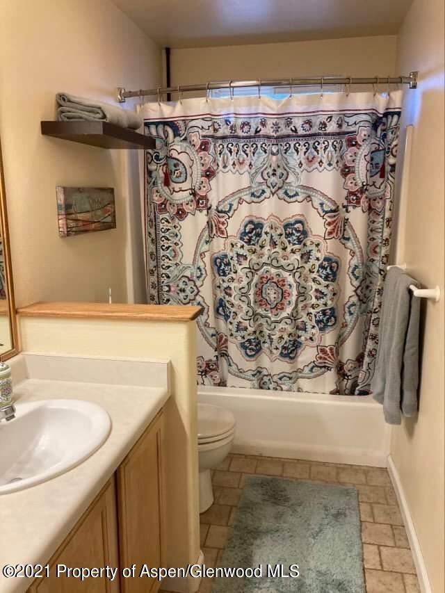 1394 Firethorn Drive Rifle, CO 81650 - Photo 21 of 43 a bathroom with a bathtub and shower