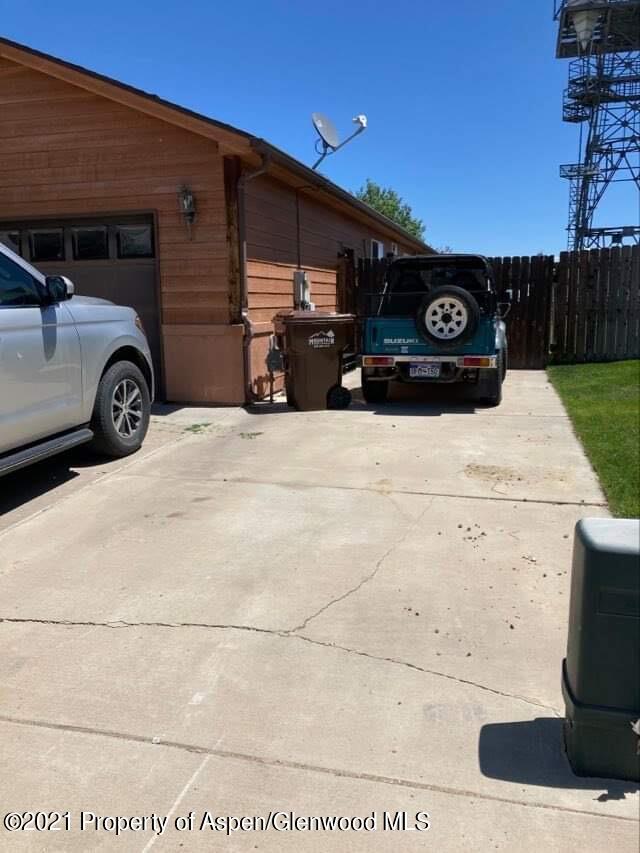 1394 Firethorn Drive Rifle, CO 81650 - Photo 7 of 43 a view of a car parked in front of a building