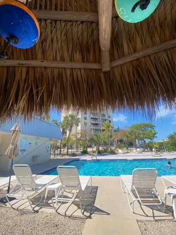 a view of outdoor space with swimming pool and patio