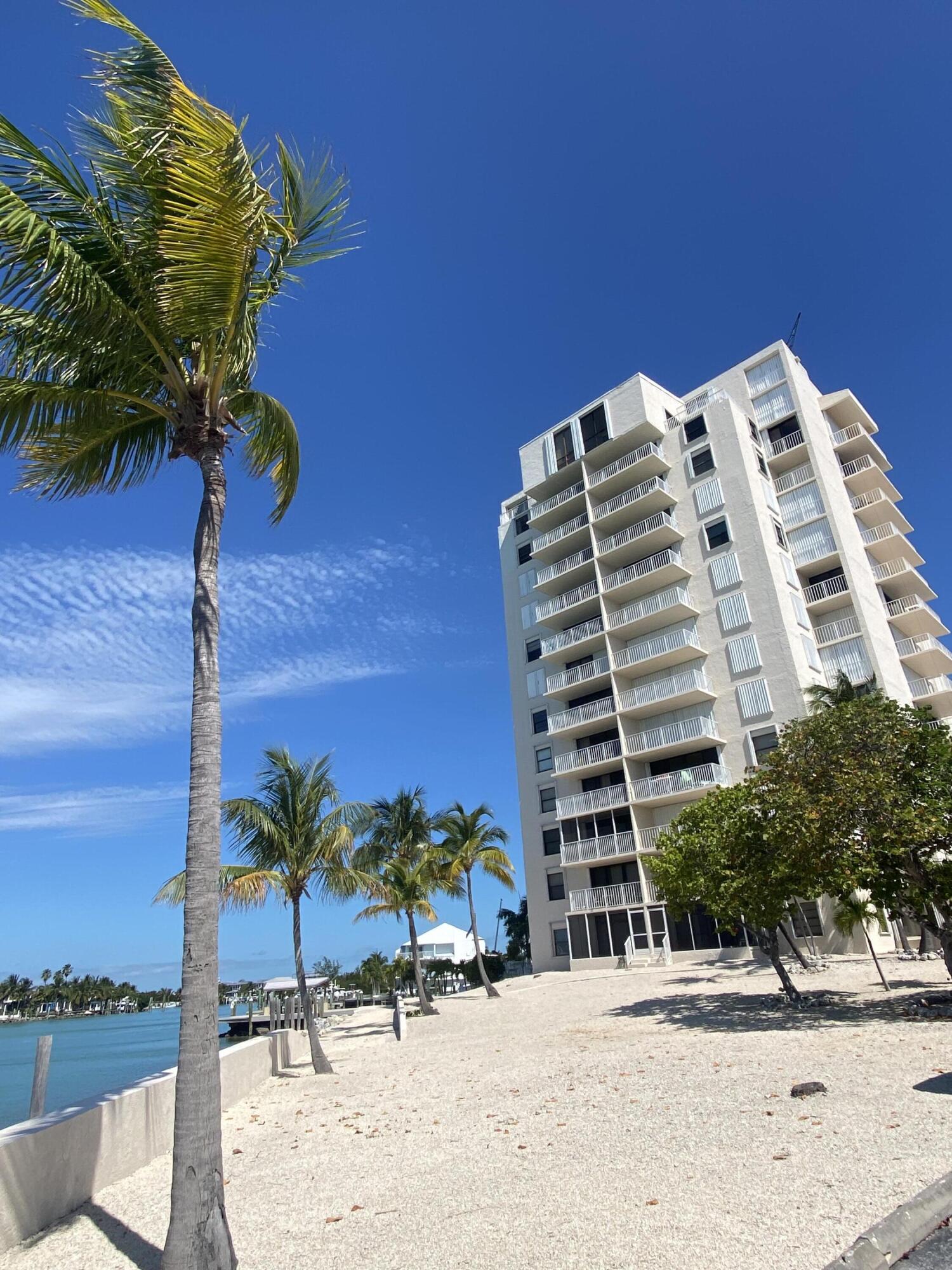 2000 Coco Plum Drive, Unit 603 Marathon, FL 33050 - Photo 19 of 22 a front view of a building