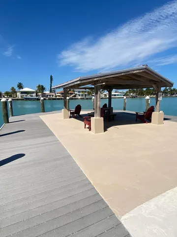 a view of outdoor space with swimming pool and furniture